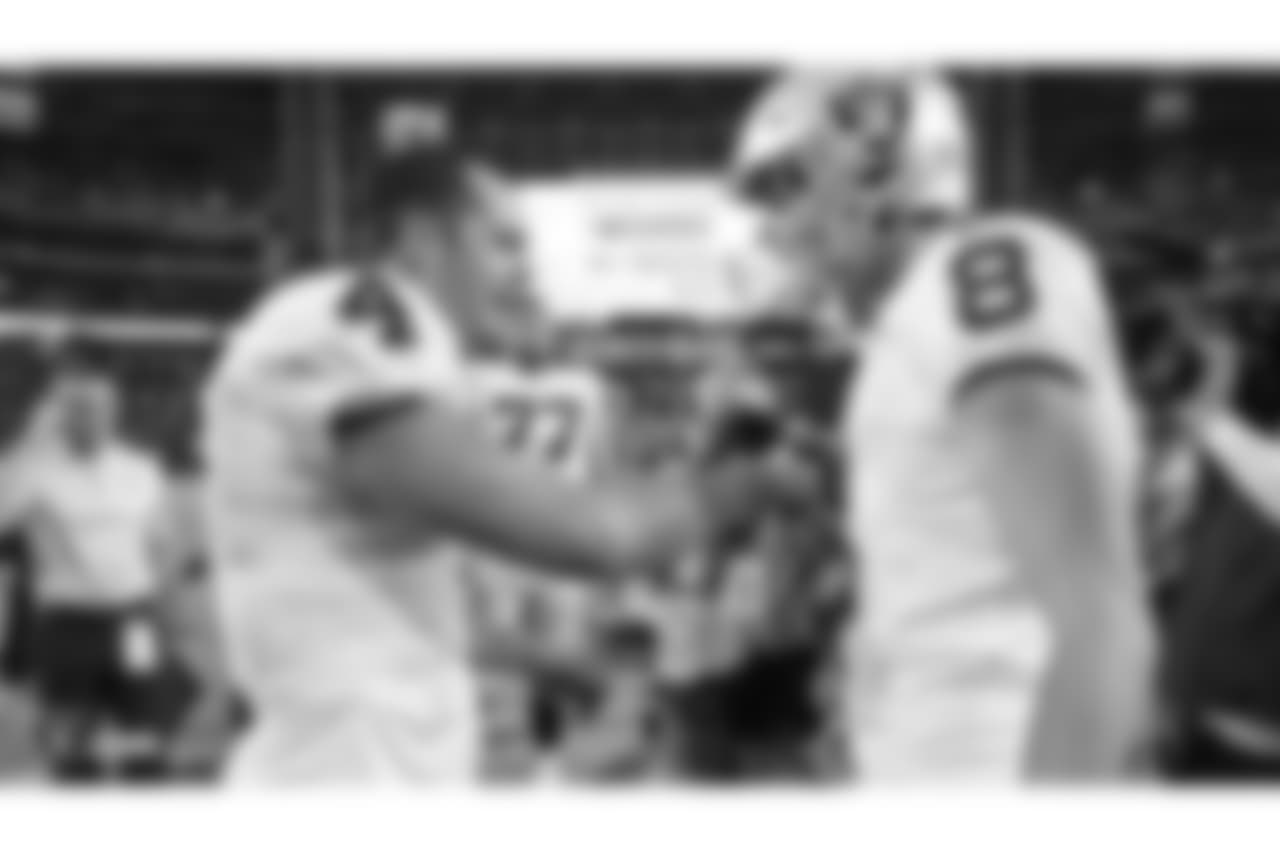Oakland Raiders quarterback Derek Carr (4) and kicker Daniel Carlson (8) after the Oakland Raiders regular season game against the Arizona Cardinals at State Farm Stadium, Sunday, November 18, 2018, in Glendale, Arizona. The Oakland Raiders won 23-21.