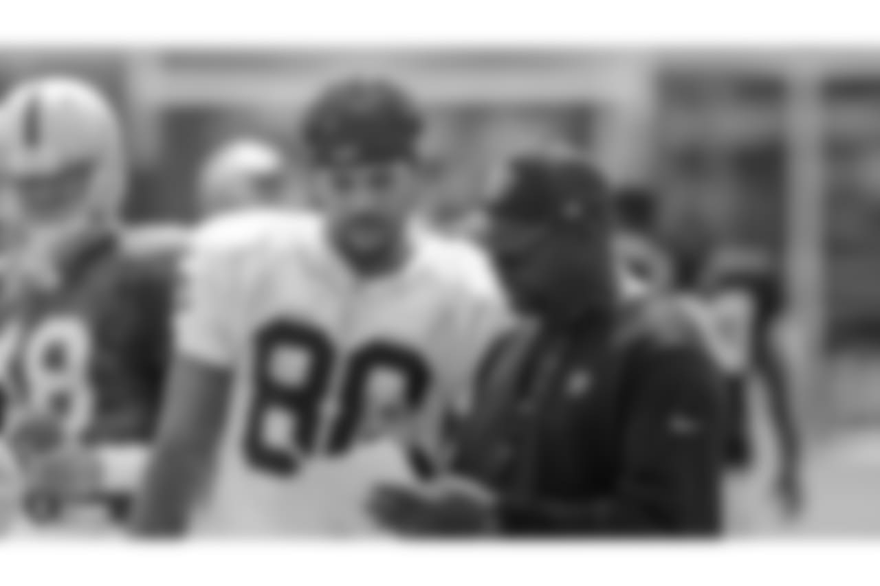 Oakland Raiders wide receiver Marcell Ateman (88) and wide receivers coach Edgar Bennett on the field for practice at 2018 Training Camp at The Oakland Raiders Napa Valley Training Complex, Friday, August 3, 2018, in Napa, California.