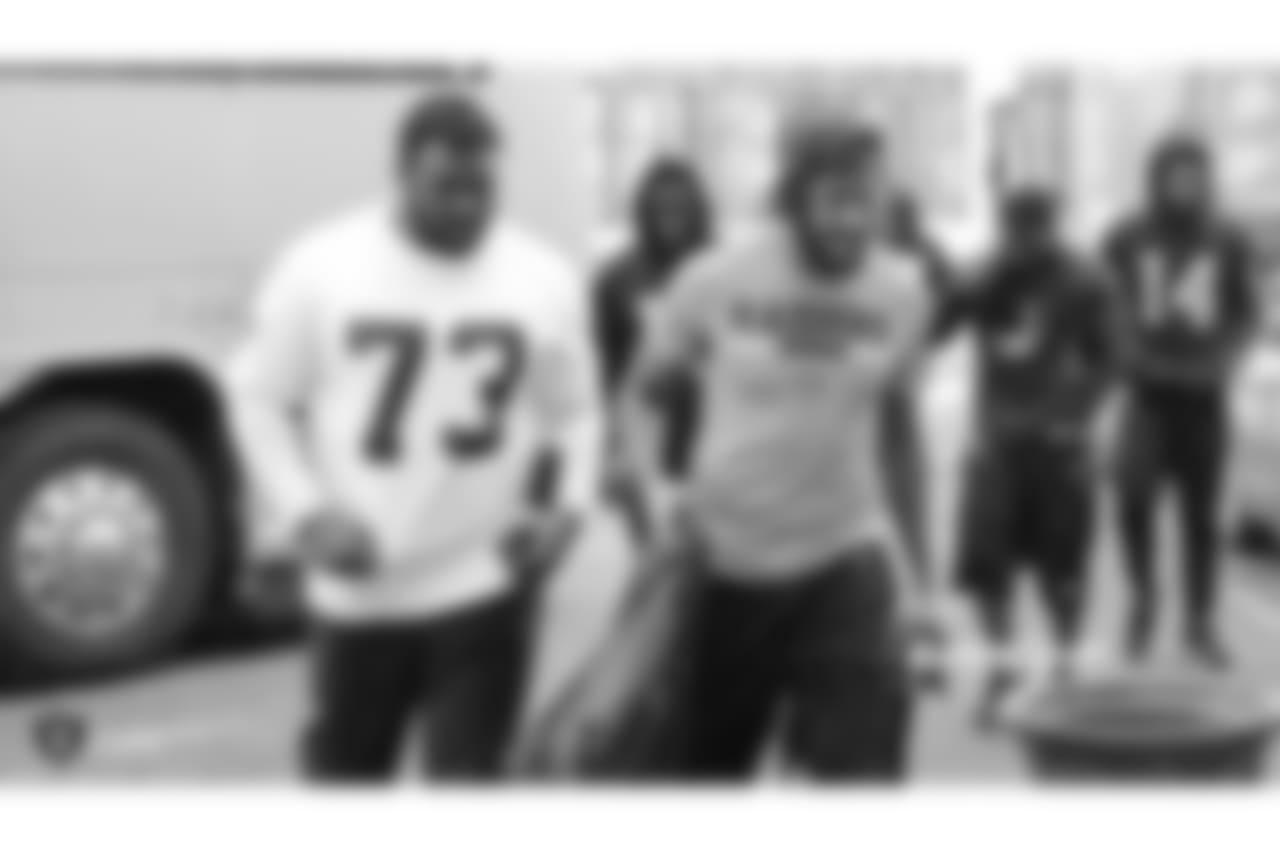 Oakland Raiders defensive tackle Maurice Hurst (73) and wide receiver Seth Roberts (10) arrive to the field for a walk through at Bladium Sports & Fitness Club, Thursday, November 29, 2018, in Alameda, California.