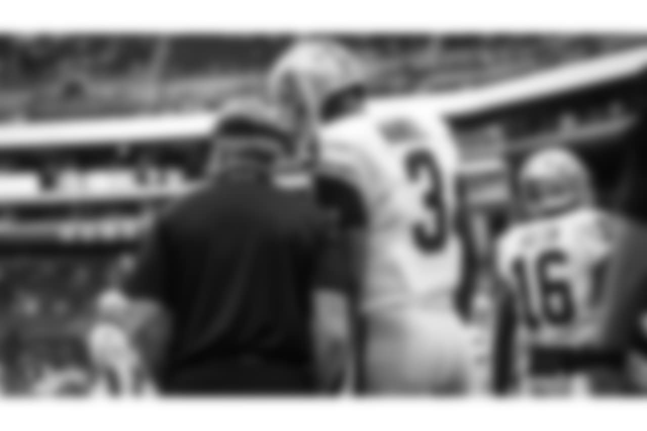Oakland Raiders head coach Jon Gruden and quarterback EJ Manuel (3) before The Oakland Raiders preseason game against the Seattle Seahawks at CenturyLink Field, Thursday, August 30, 2018, in Seattle, Washington. The Oakland Raiders won 30-19.