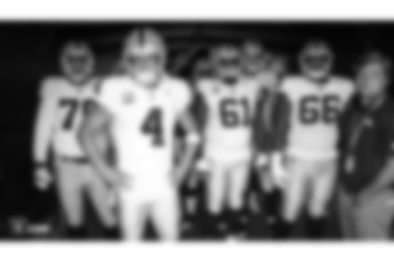 Raiders offensive guard Jon Feliciano (76), quarterback Derek Carr (4), center Rodney Hudson (61) and offensive guard Gabe Jackson (66) before Week 2 at Broncos Stadium at Mile High, Sunday, September 16, 2018, in Denver, Colorado.