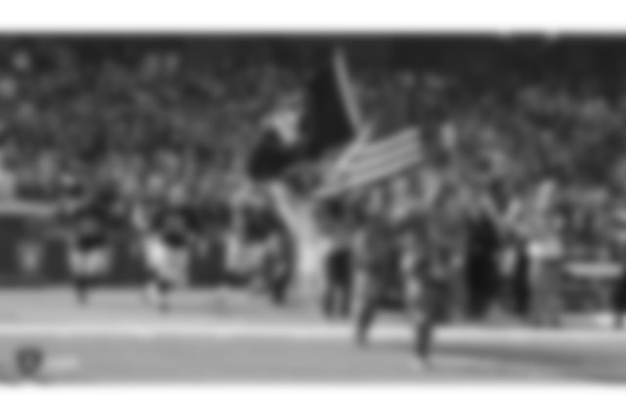 The Oakland Raiders, led by the military, are introduced onto the field before their regular season game against the Los Angeles Chargers at Oakland-Alameda County Coliseum, Sunday, November 11, 2018, in Oakland, California. The Oakland Raiders lost 20-6.