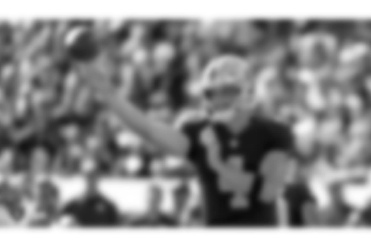 Oakland Raiders quarterback Derek Carr (4) throws a pass during the Oakland Raiders game against the Indianapolis Colts at Oakland-Alameda County Coliseum, Sunday, October 28, 2018, in Oakland, California. Oakland Raiders lost 42-28.