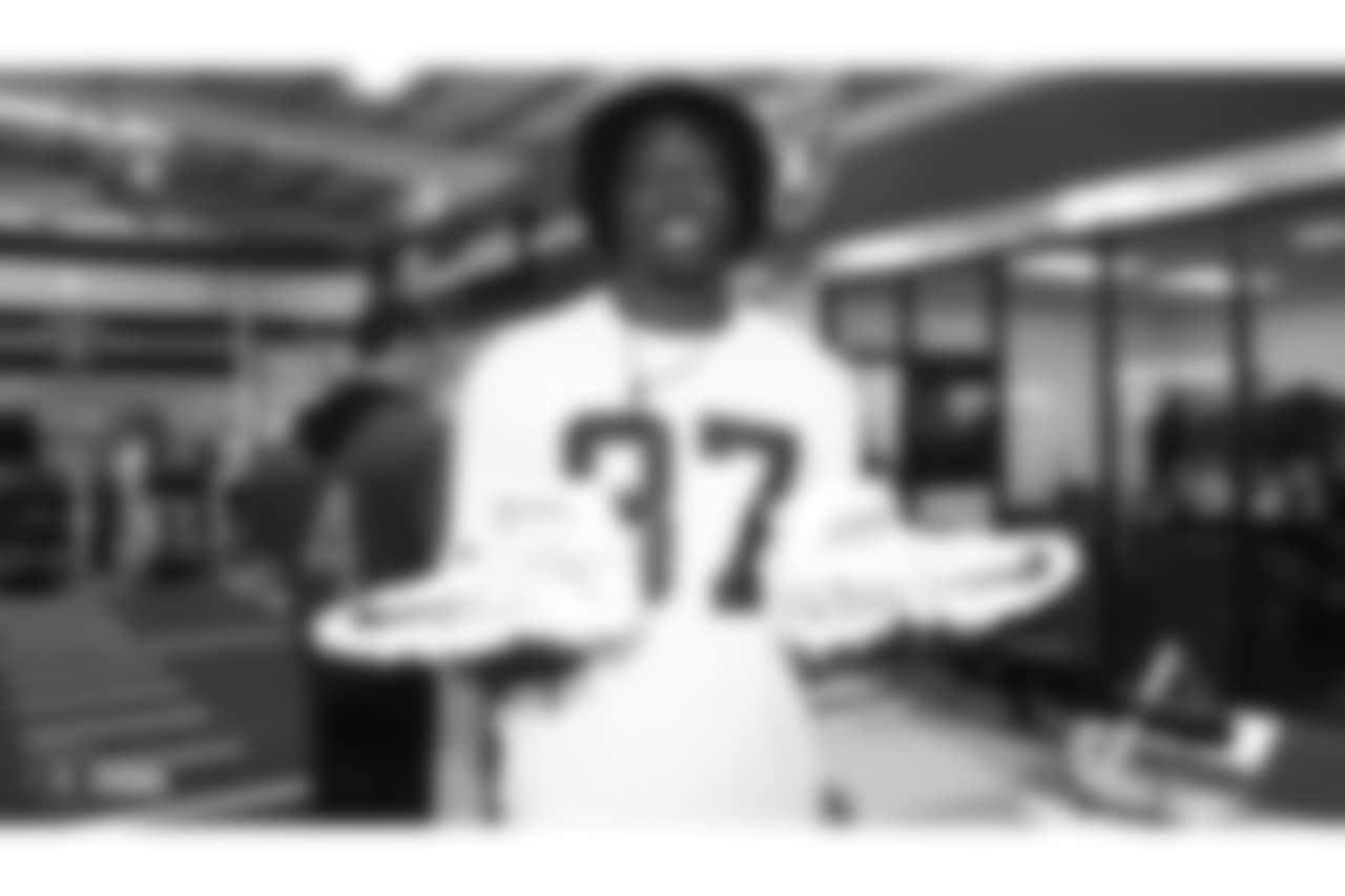 Oakland Raiders tight end Jared Cook (87) unboxes their custom cleats for the NFL's My Cause My Cleats campaign at the Oakland Raiders Practice Facility, Wednesday, November 21, 2018, in Alameda, California.