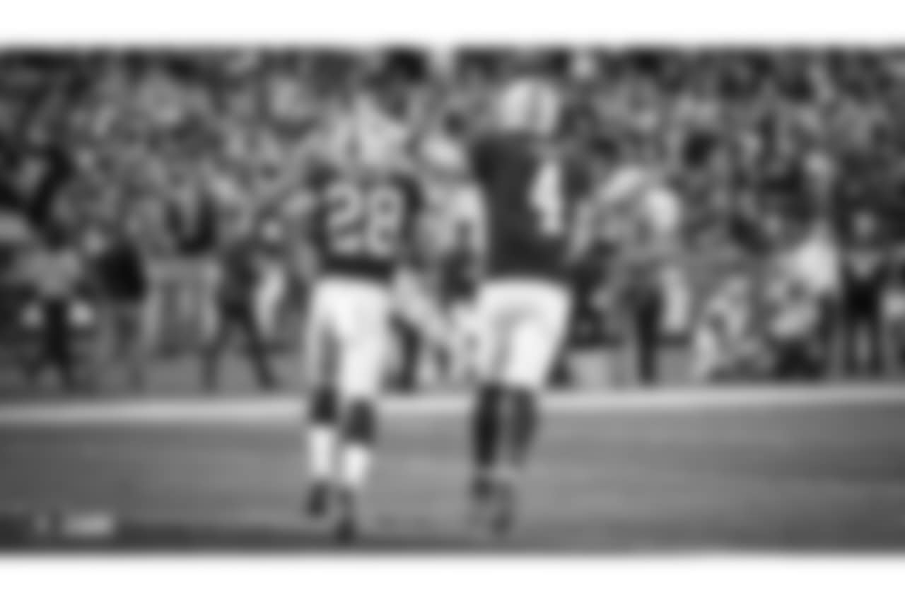 Oakland Raiders running back Doug Martin (28) and quarterback Derek Carr (4) during the Oakland Raiders regular season game against the Kansas City Chiefs at Oakland-Alameda County Coliseum, Sunday, December 2, 2018, in Alameda, California. The Oakland Raiders lost 40-33.