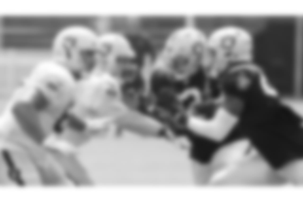 Oakland Raiders offensive lineman Ian Silberman (67), offensive guard Jon Feliciano (76), defensive tackle Maurice Hurst (73), and defensive end Arden Key (99) on the field for practice at 2018 Training Camp at The Oakland Raiders Napa Valley Training Complex, Friday, August 3, 2018, in Napa, California.
