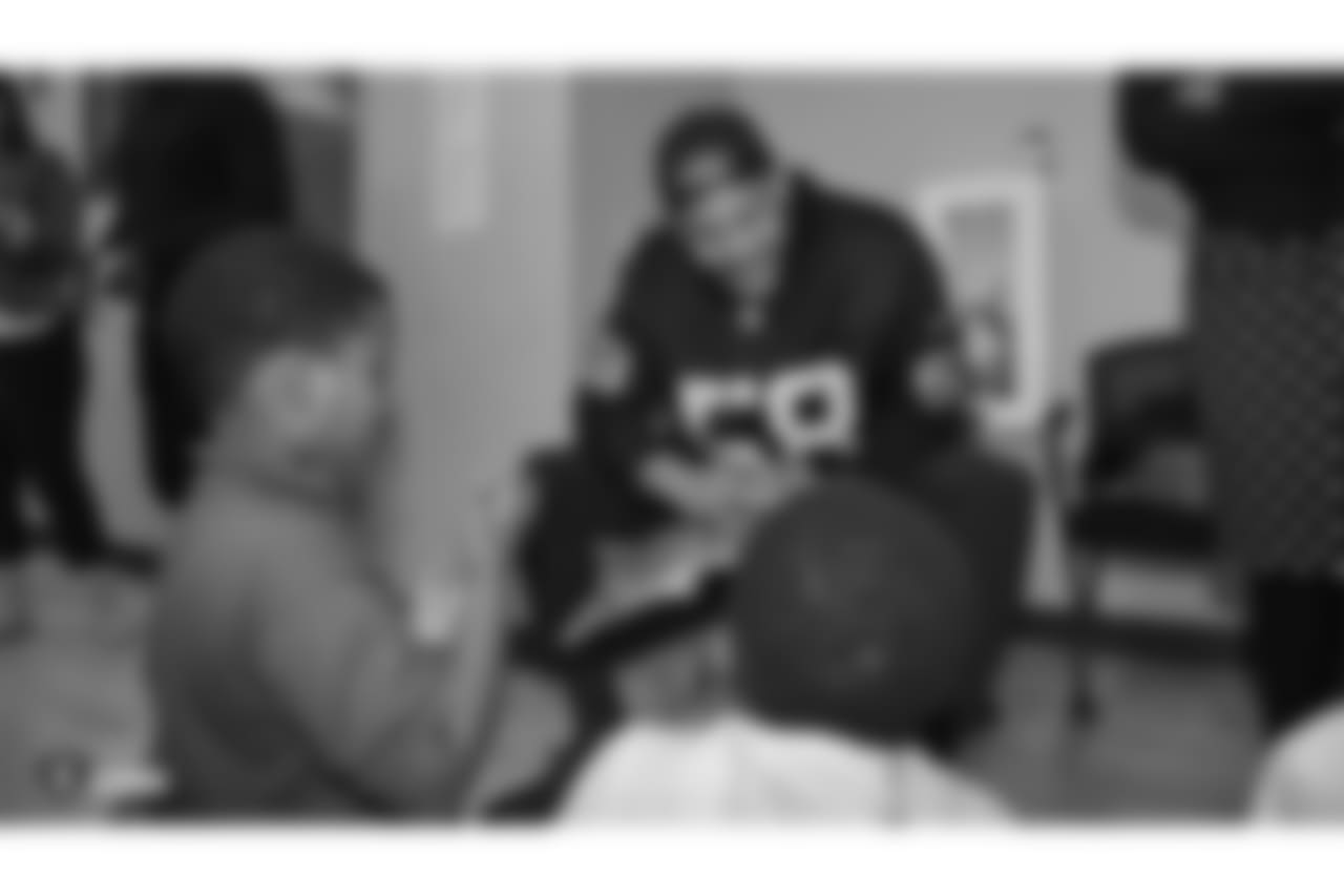 Oakland Raiders defensive tackle Clinton McDonald and his Light Into Darkness Foundation, along with linebacker Emmanuel Lamur, linebacker Kyle Wilber, punter Johnny Townsend, defensive tackle Frostee Rucker, and fullback Ryan Yurachek, partner with the nonprofit First Book by hosting a reading party to promote literacy at the West Oakland Youth Center, Tuesday, December 11, 2018, in Oakland, California.