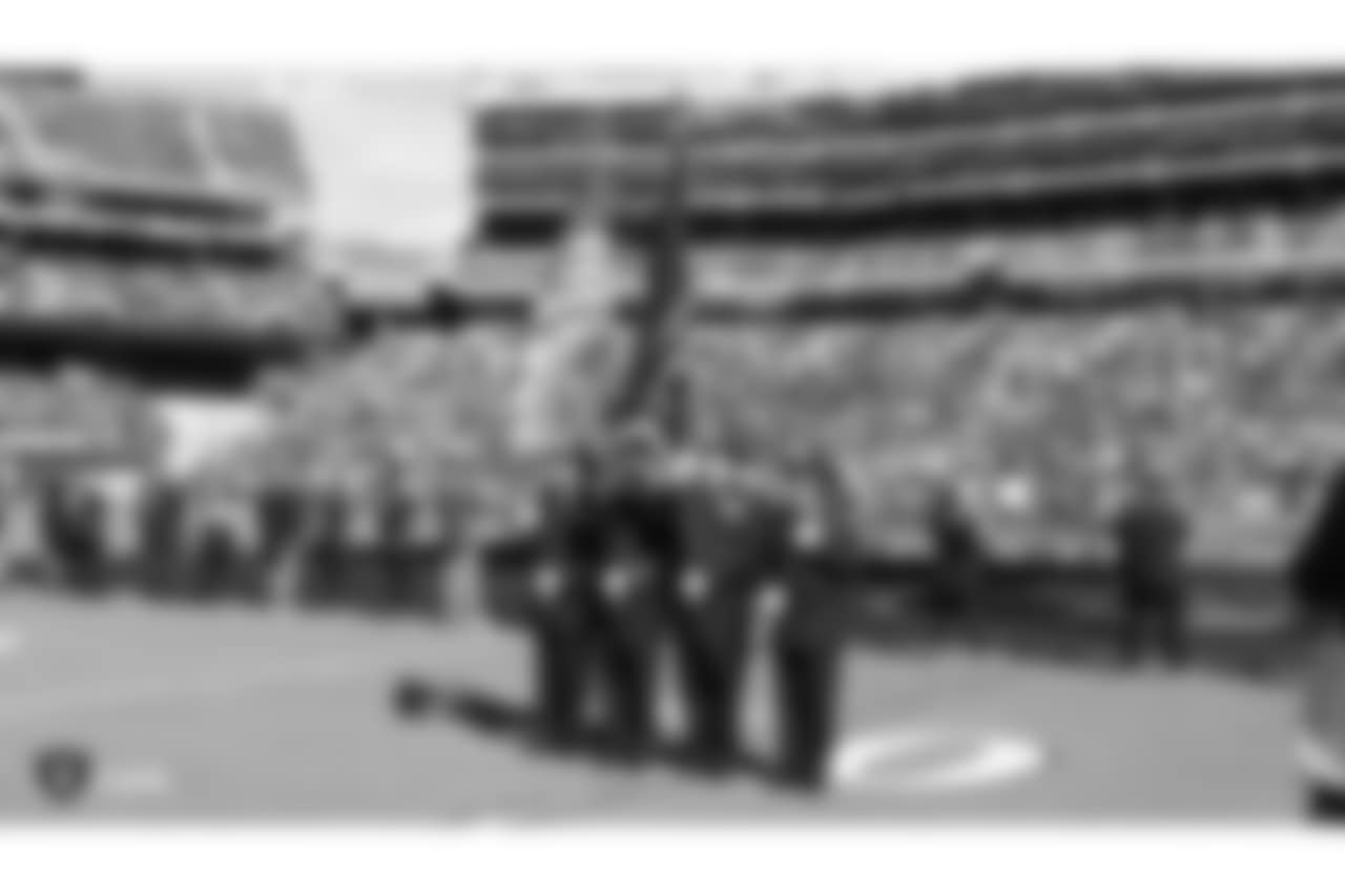 The Oakland Fire Department presents the nation's colors during the national anthem before The Oakland Raiders regular season game against the Indianapolis Colts at Oakland-Alameda County Coliseum, Sunday, October 28, 2018, in Oakland, California. The Oakland Raiders lost 42-28.