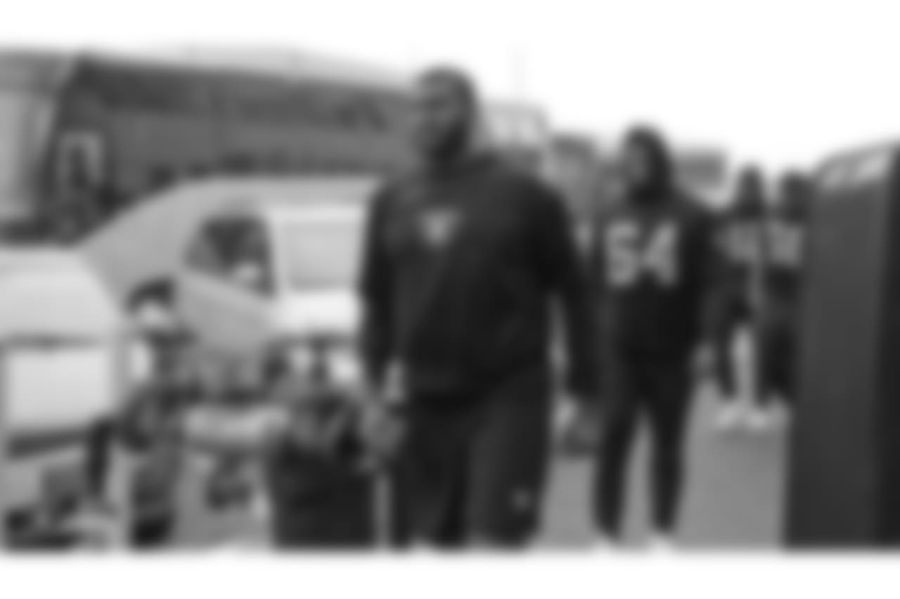 Oakland Raiders tackle Brandon Parker (75) arrives to the field for a walk through at Bladium Sports & Fitness Club, Thursday, November 29, 2018, in Alameda, California.