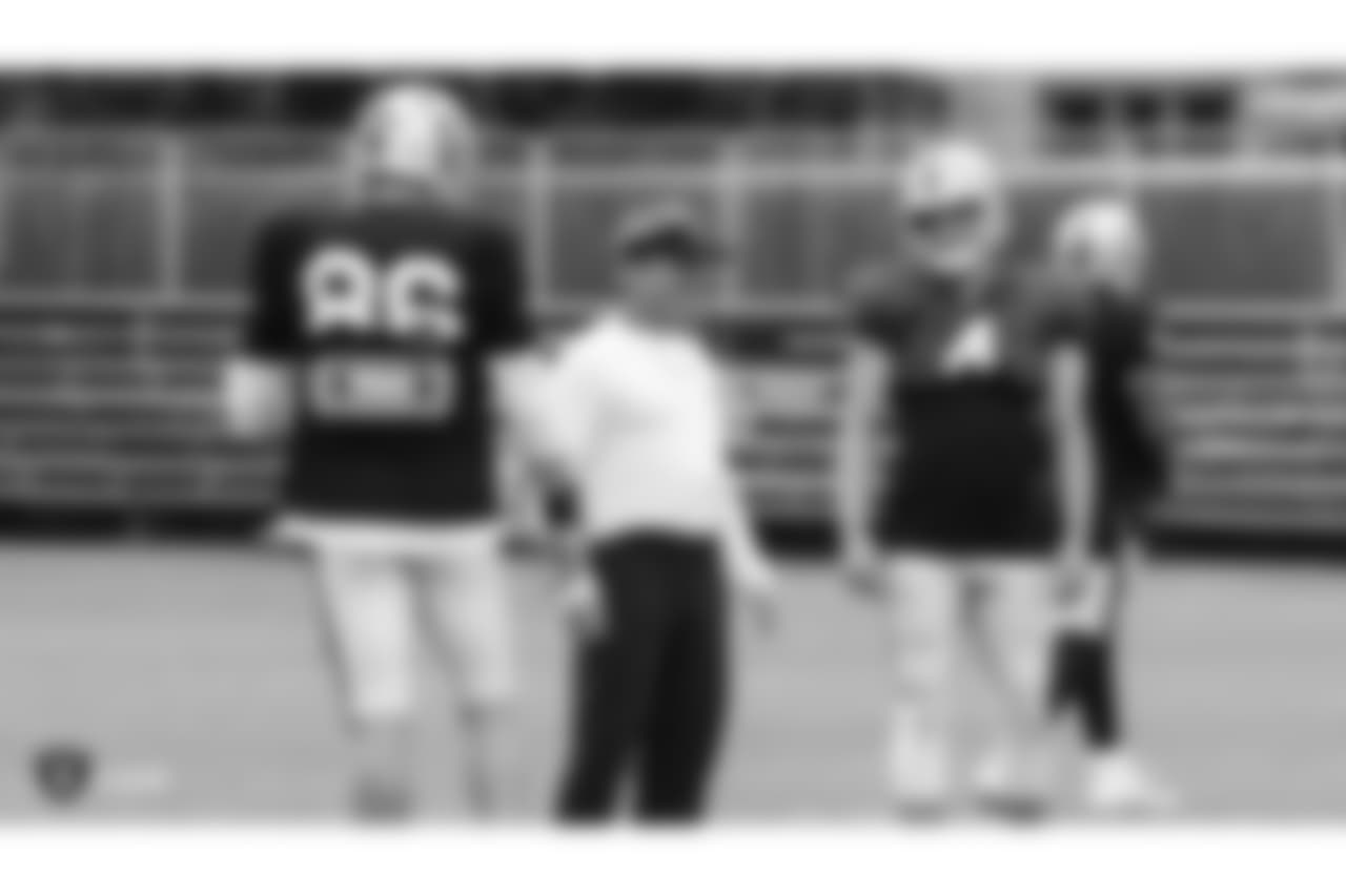 Oakland Raiders tight end Lee Smith (86), head coach Jon Gruden, and quarterback Derek Carr (4) on the field for practice at 2018 Training Camp at The Oakland Raiders Napa Valley Training Complex, Tuesday, August 14, 2018, in Napa, California.