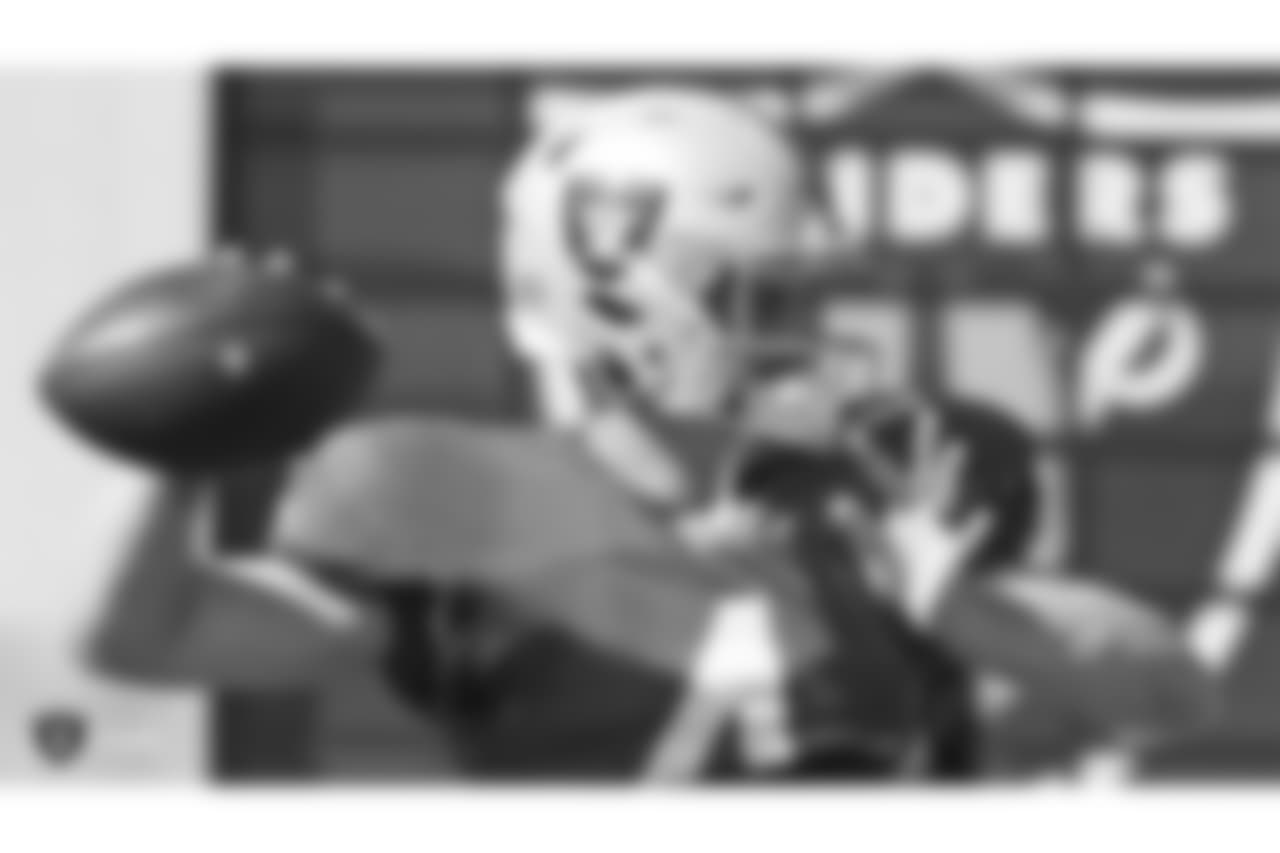 Oakland Raiders quarterback Derek Carr (4) on the field for practice at The Oakland Raiders Practice Facility, Wednesday, October 24, 2018, in Alameda, California.