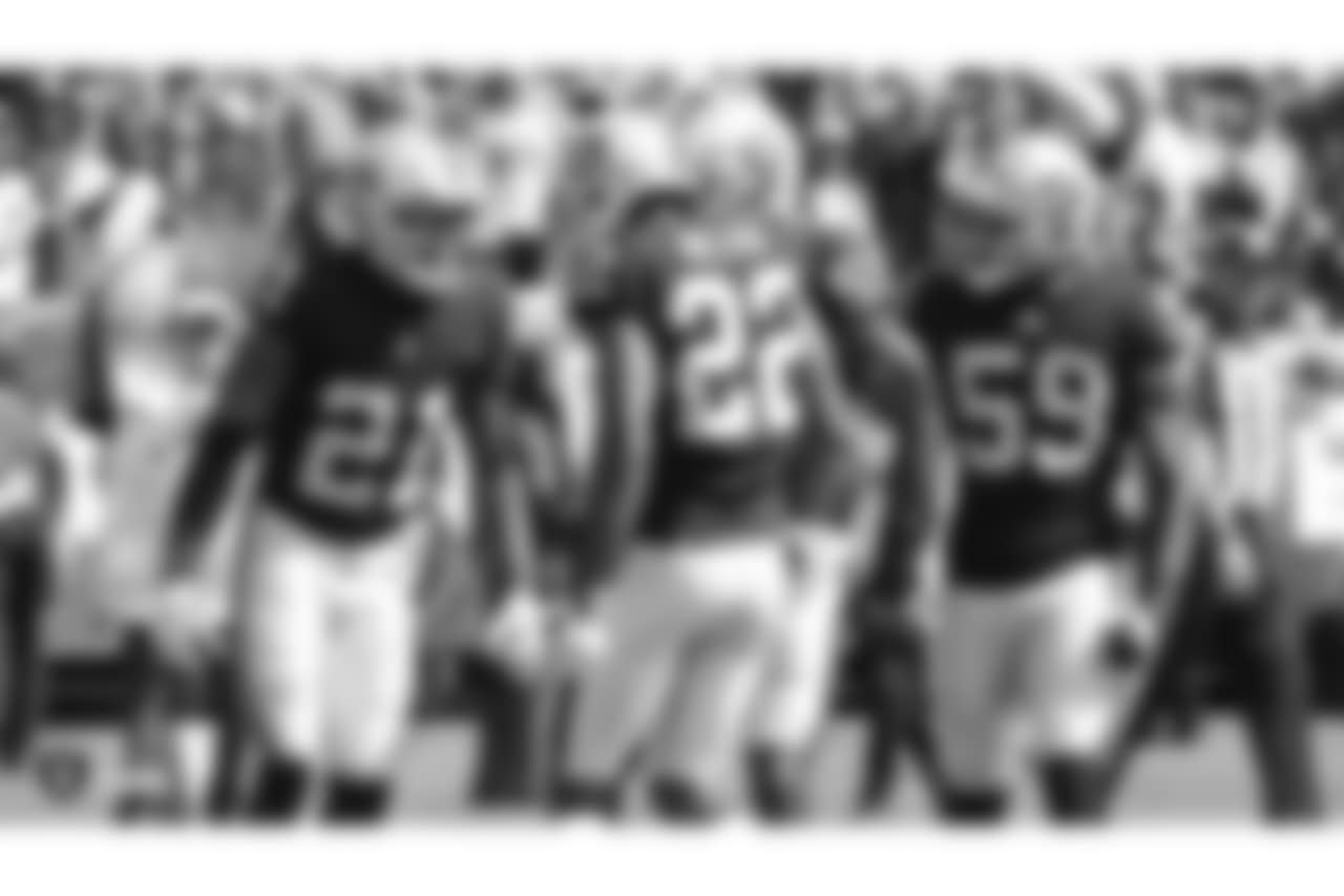 Oakland Raiders cornerback Gareon Conley (21), cornerback Rahsaan Melvin (22), and linebacker Tahir Whitehead (59) during The Oakland Raiders regular season game against the Cleveland Browns at Oakland-Alameda County Coliseum, Sunday, September 30, 2018, in Oakland, California. The Oakland Raiders won 45-42.