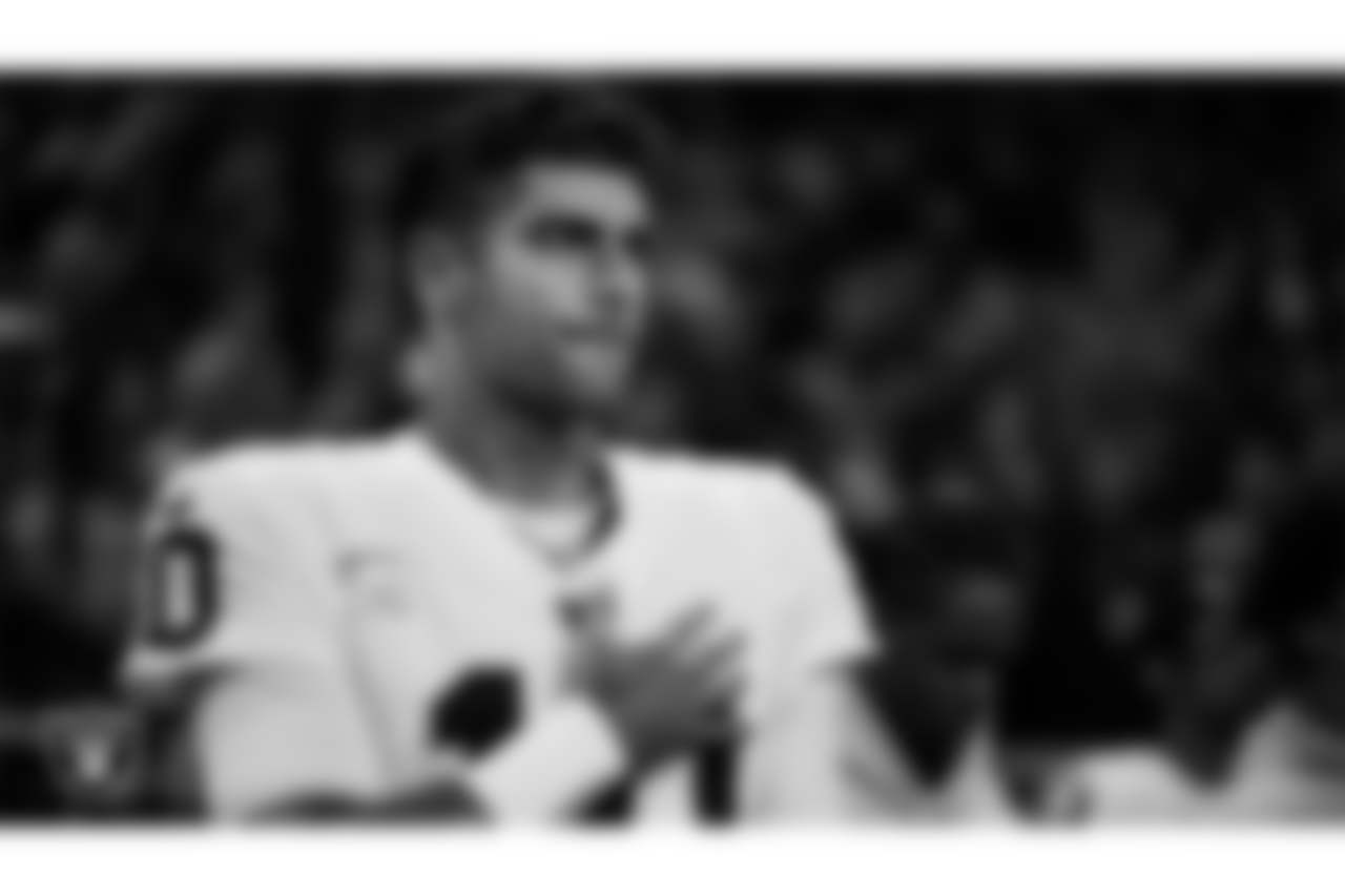 Las Vegas Raiders quarterback Jimmy Garoppolo (10) during the national anthem before the regular season away game against the Detroit Lions at Ford Field.