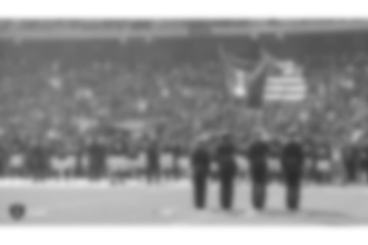 All five branches of military present the nation's colors during the national anthem before the Oakland Raiders regular season game against the Los Angeles Chargers at Oakland-Alameda County Coliseum, Sunday, November 11, 2018, in Oakland, California. The Oakland Raiders lost 20-6.