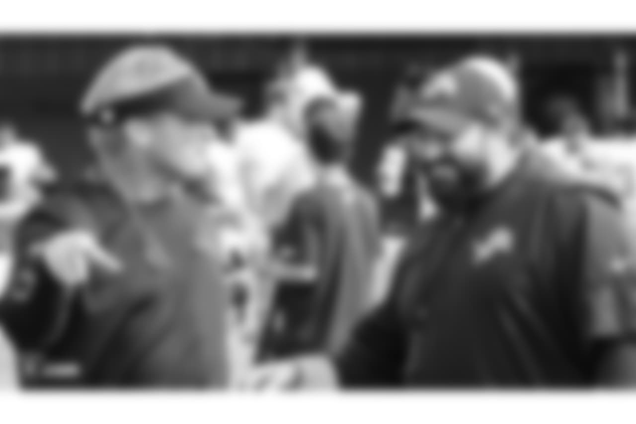 Oakland Raiders head coach Jon Gruden talking to head coach of the Detroit Lions Matt Patricia on the field for practice at 2018 Training Camp at The Oakland Raiders Napa Valley Training Complex, Monday, August 7, 2018, in Napa, California.