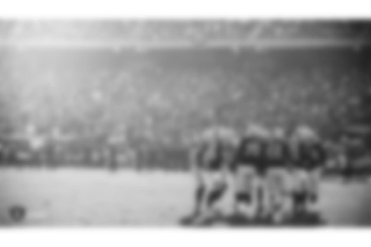 The Oakland Raiders offense huddles up during the Oakland Raiders regular season game against the Pittsburgh Steelers at Oakland-Alameda County Coliseum, Sunday, December 9, 2018, in Oakland, California. The Oakland Raiders won 24-21.