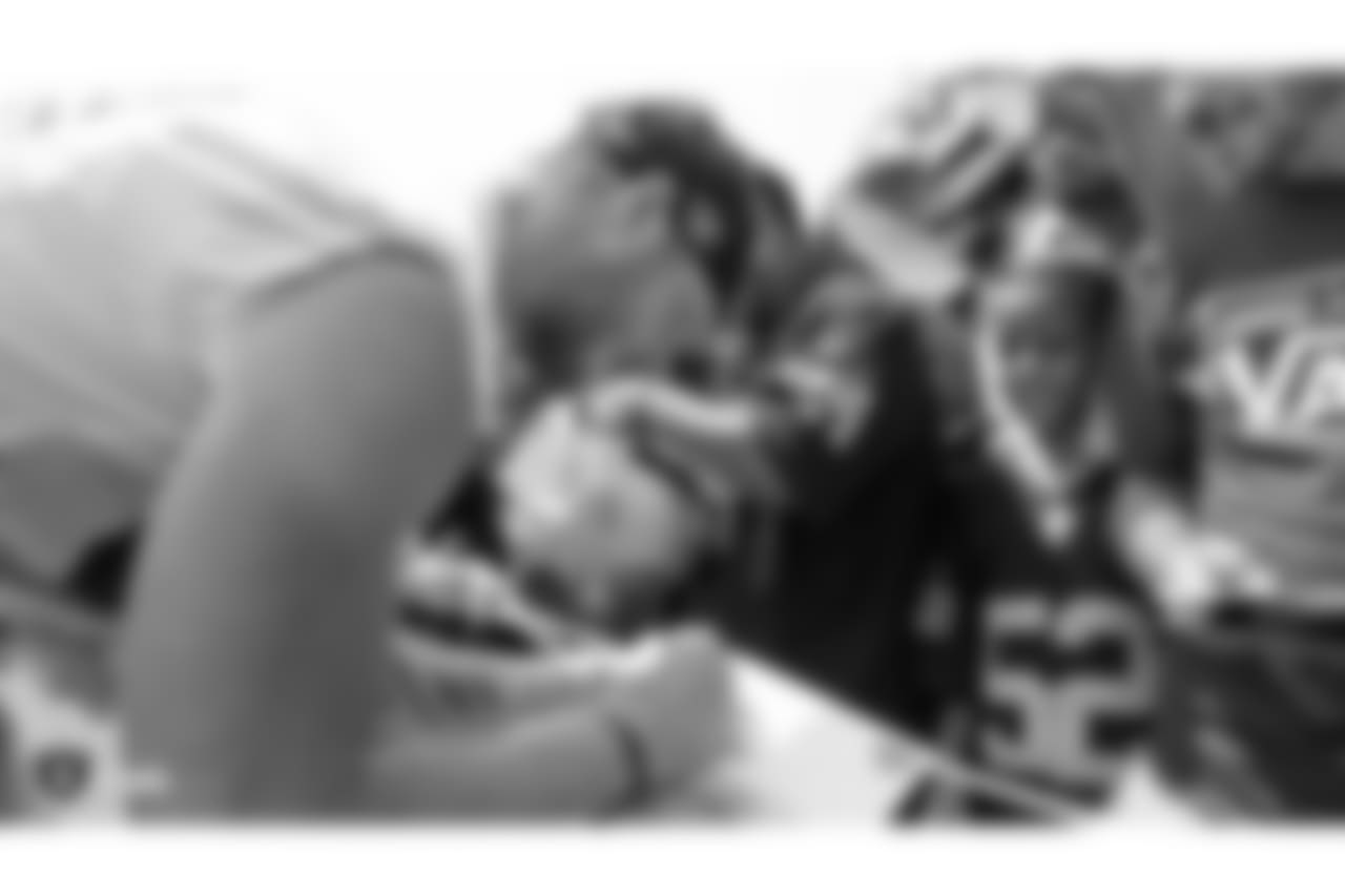 Oakland Raiders tight end Paul Butler (84) signs autographs for fans after practice at 2018 Training Camp at The Oakland Raiders Napa Valley Training Complex, Wednesday, August 1, 2018, in Napa, California.