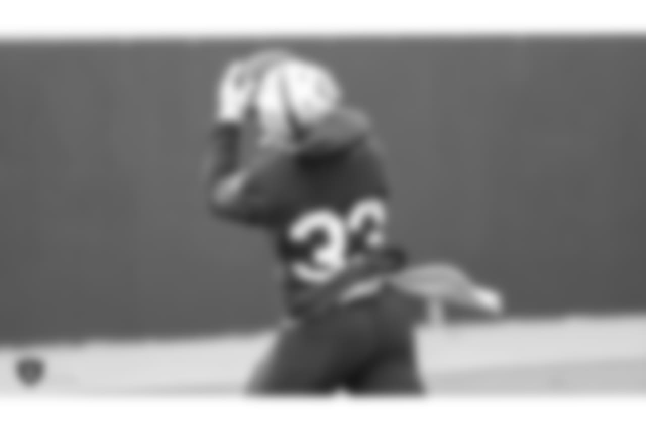 Oakland Raiders running back DeAndré Washington (33) on the field for practice at the Oakland Raiders Practice Facility, Friday, December 21, 2018, in Alameda, California.