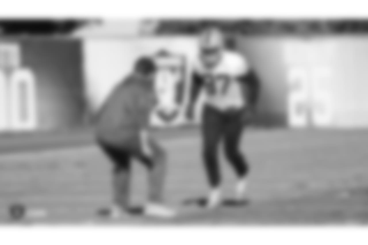 Oakland Raiders tight ends coach Frank Smith and tight end Jared Cook (87) on the field for practice at the Oakland Raiders Practice Facility, Thursday, December 27, 2018, in Alameda, California.