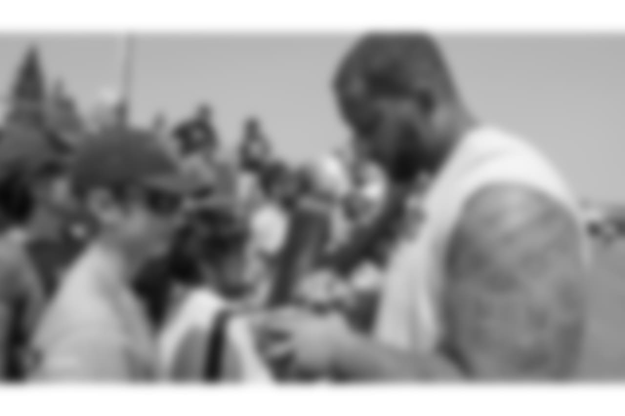 Oakland Raiders offensive lineman Ian Silberman (67) signs autographs for fans after practice at 2018 Training Camp at The Oakland Raiders Napa Valley Training Complex, Friday, August 3, 2018, in Napa, California.