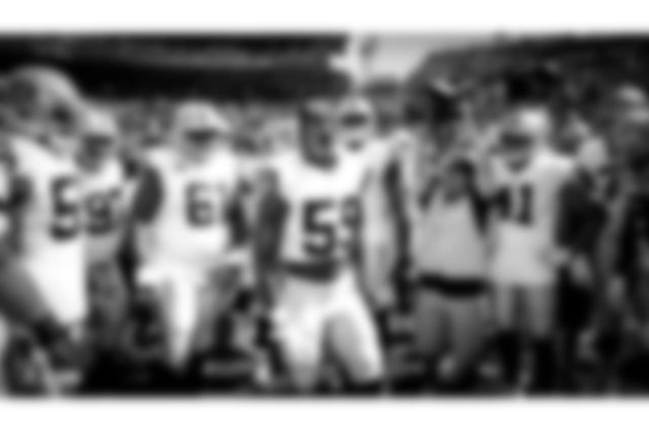 Oakland Raiders linebacker Tahir Whitehead (59) huddles up the team before the Oakland Raiders regular season game against the Denver Broncos at Mile High Stadium, Sunday, September 16, 2018, in Denver, Colorado. the Oakland Raiders lost 33-13.