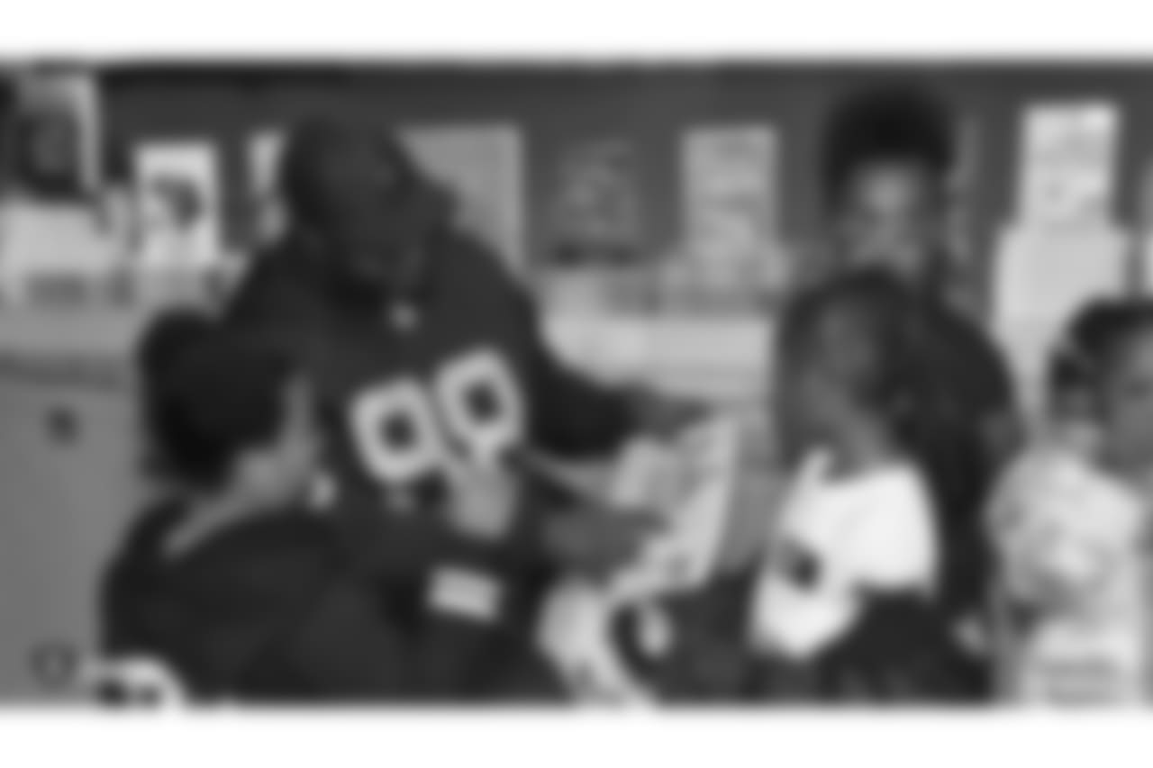 Oakland Raiders defensive tackle Clinton McDonald and his Light Into Darkness Foundation, along with linebacker Emmanuel Lamur, linebacker Kyle Wilber, punter Johnny Townsend, defensive tackle Frostee Rucker, and fullback Ryan Yurachek, partner with the nonprofit First Book by hosting a reading party to promote literacy at the West Oakland Youth Center, Tuesday, December 11, 2018, in Oakland, California.