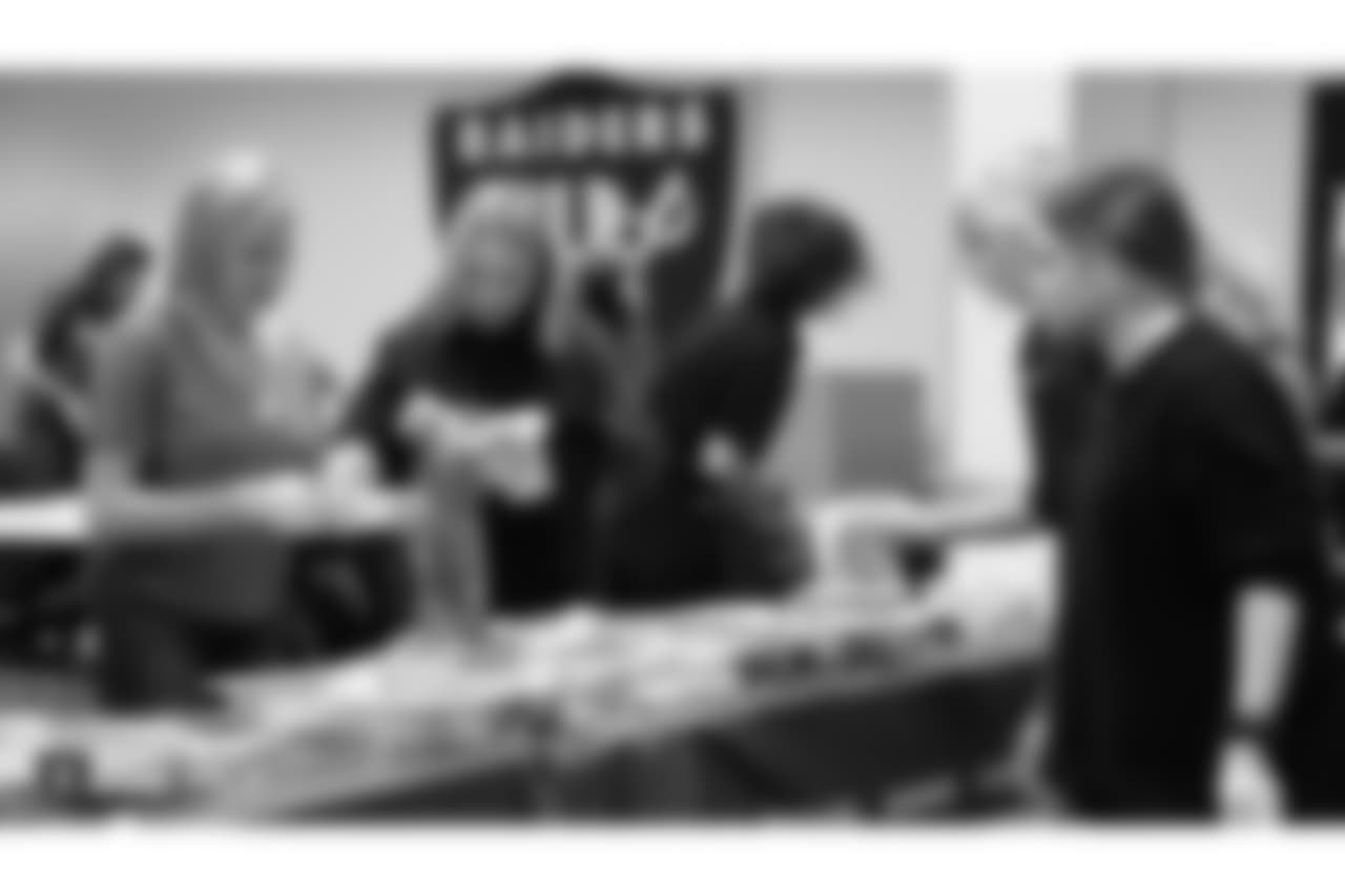 The Raiders Women's Association teamed up with Pledge to Humanity by making and packaging sandwiches and toiletry packs for the underserved in the Oakland community at the Oakland Raiders Practice Facility, Saturday, November 24, 2018, in Alameda, California.