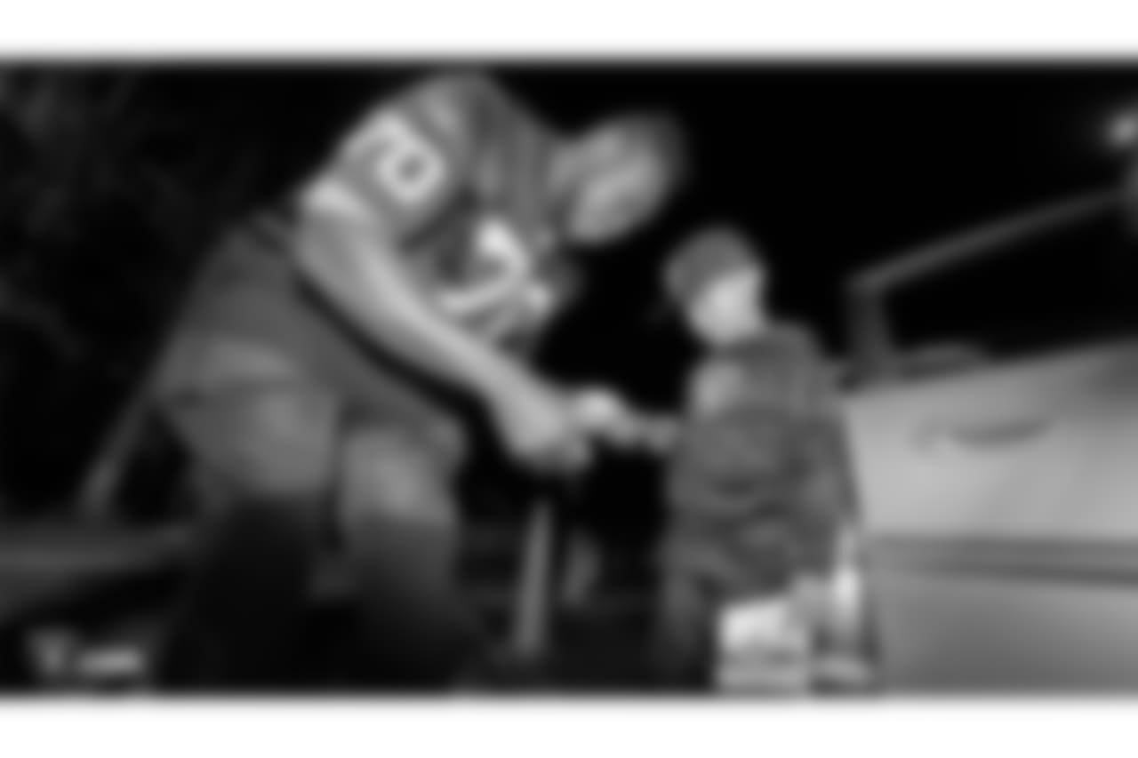 The Oakland Raiders offensive line, center Rodney Hudson, tackle Justin Murray, offensive lineman Ian Silberman, guard/tackle Kelechi Osemele, tackle Donald Penn, tackle Brandon Parker, guard/center Jon Feliciano, tackle Kolton Miller, guard/tackle Denver Kirkland, and tackle Jamar McGloster, welcome families and community partners to the Raiders Practice Facility to distribute Thanksgiving turkeys and fixings, Tuesday, November 20, 2018, in Alameda, California.