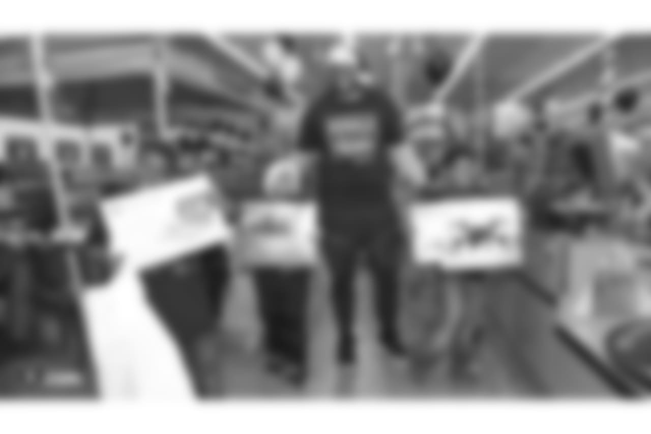 Donald Penn's SHOP WITH A JOCK gives 25 kids from the East Oakland Youth Development Center a chance to fulfill their holiday wish list by receiving a $300 Walmart gift card and a chance to go on an shopping spree with Oakland Raiders tackle Donald Penn at Walmart, Tuesday, December 18, 2018, in San Leandro, California. Joining tackle Donald Penn are guard/tackle Kelechi Osemele, guard Cameron Hunt, tackle Brandon Parker, tackle Jamar McGloster, punter Johnny Townsend, fullback Ryan Yurachek, tight end Darren Waller, tight end Paul Butler, and defensive tackle Clinton McDonald.