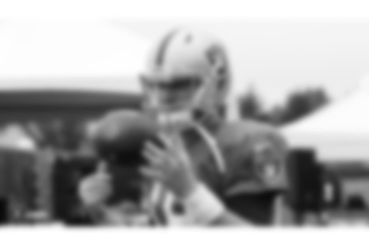 Oakland Raiders quarterback Connor Cook (18) on the field for practice at 2018 Training Camp at The Oakland Raiders Napa Valley Training Complex, Tuesday, August 14, 2018, in Napa, California.