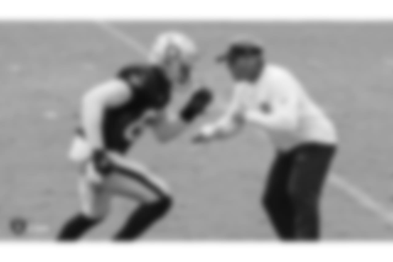 Oakland Raiders tight end Jared Cook (87) and head coach Jon Gruden on the field for practice at 2018 Training Camp at The Oakland Raiders Napa Valley Training Complex, Tuesday, August 14, 2018, in Napa, California.