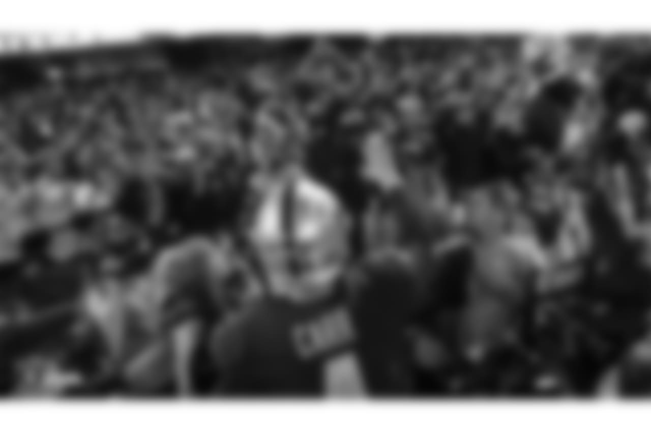 Oakland Raiders quarterback Derek Carr (4) celebrates with the fans during the Oakland Raiders game against the Denver Broncos at Oakland-Alameda County Coliseum, Monday, December 24, 2018, in Oakland, California. Oakland won 27-14.