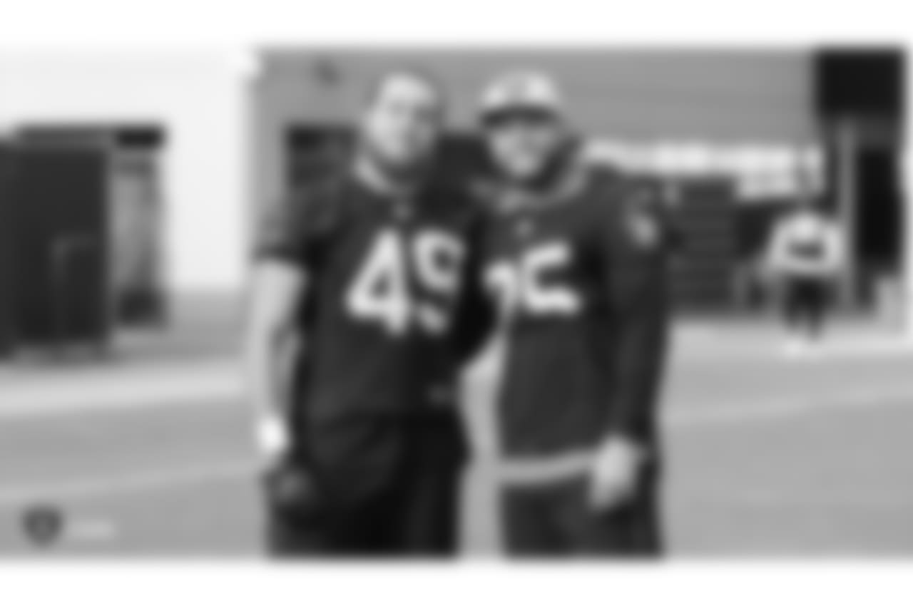 Oakland Raiders linebacker James Cowser (49) and safety Erik Harris (25) on the field for a walk through at the Oakland Raiders Practice Facility, Friday, December 14, 2018, in Alameda, California.