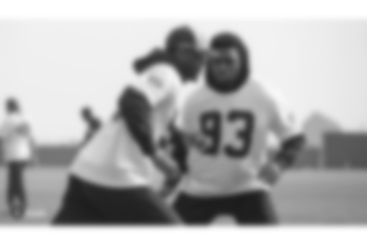 Oakland Raiders linebacker Shilique Calhoun (91) and defensive end Jacquies Smith (93) on the field for practice at the Oakland Raiders Practice Facility, Friday, November 9, 2018, in Alameda, California.