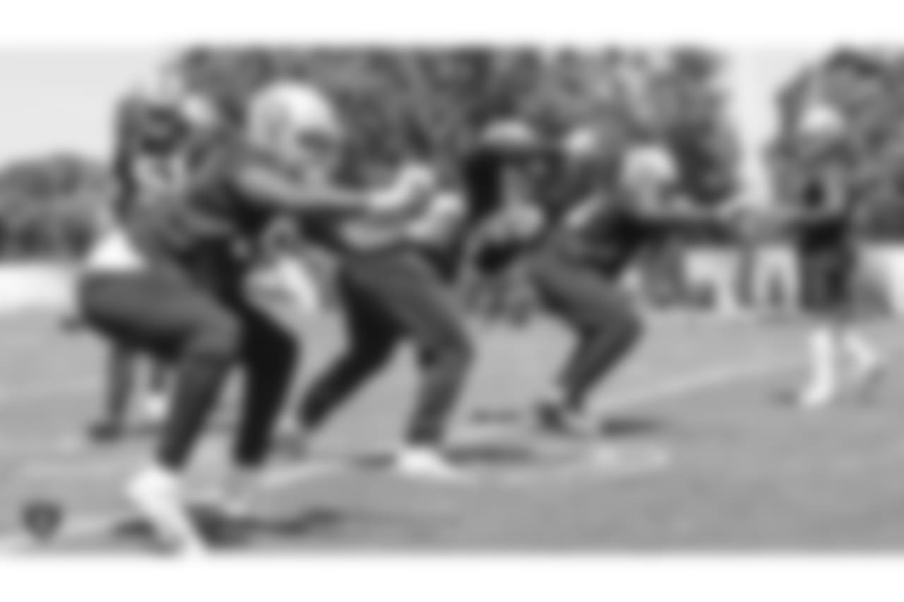 Oakland Raiders defensive end Arden Key (99), defensive tackle Treyvon Hester (90), and defensive lineman Shakir Soto (64) at an Organized Team Activity (OTA) at the Oakland Raiders Practice Facility, Monday, June 4, 2018, in Alameda, California.