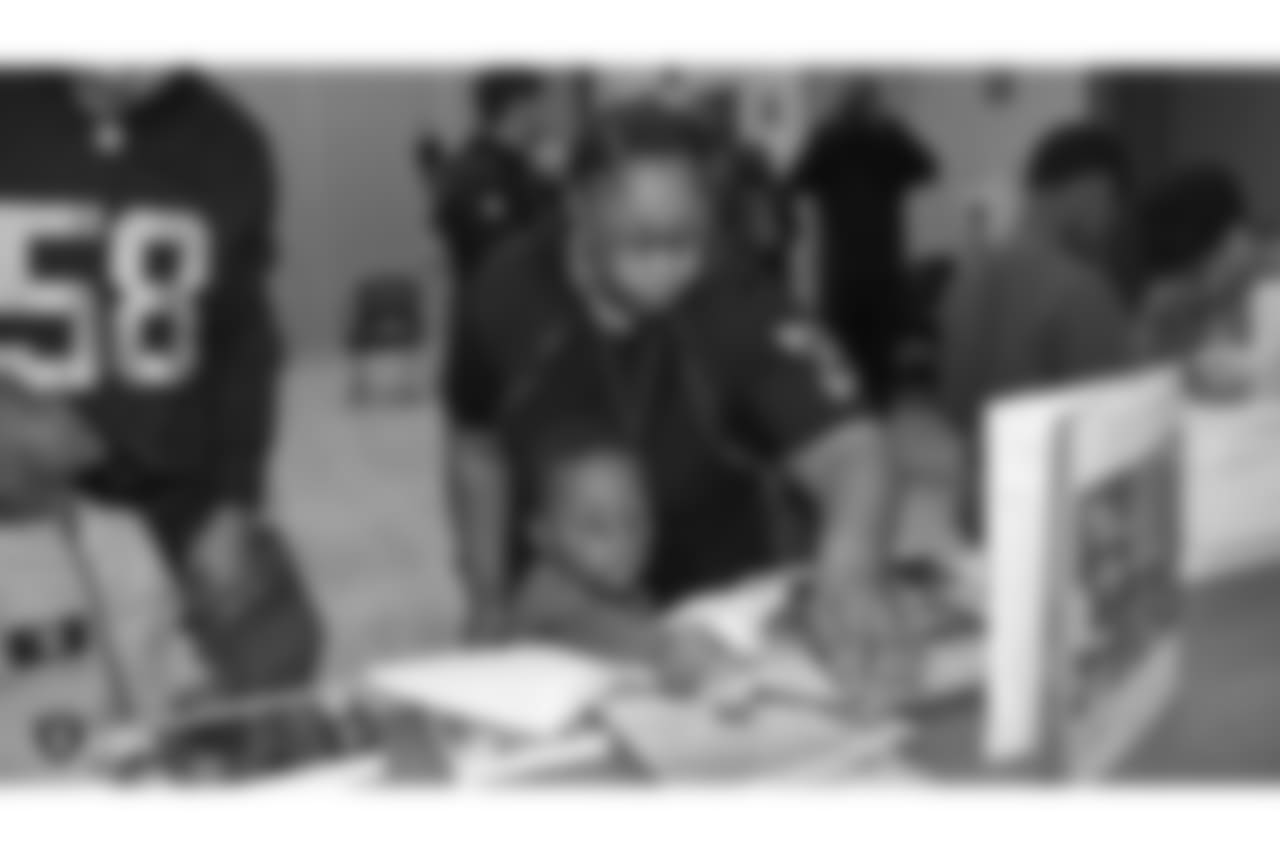 Oakland Raiders defensive tackle Clinton McDonald and his Light Into Darkness Foundation, along with linebacker Emmanuel Lamur, linebacker Kyle Wilber, punter Johnny Townsend, defensive tackle Frostee Rucker, and fullback Ryan Yurachek, partner with the nonprofit First Book by hosting a reading party to promote literacy at the West Oakland Youth Center, Tuesday, December 11, 2018, in Oakland, California.