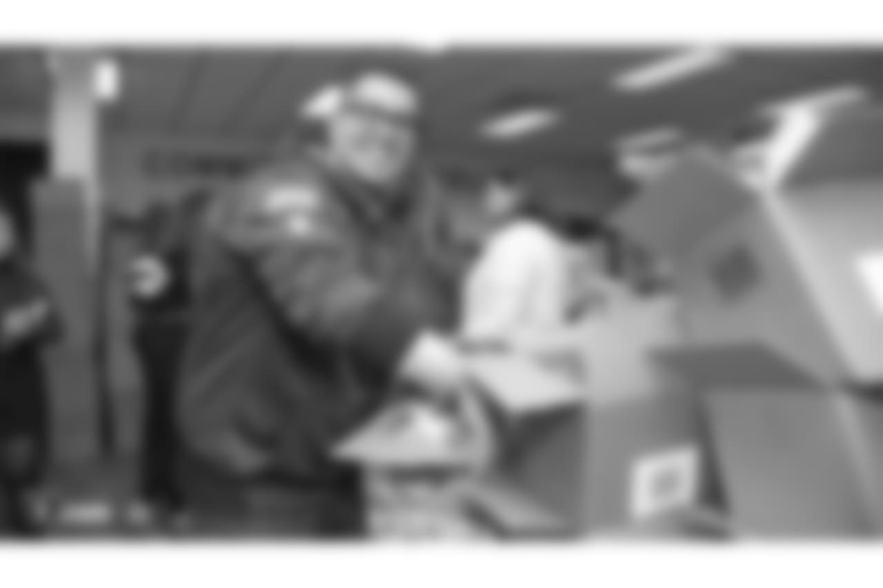 Oakland Raiders linebacker Kyle Wilber (58), tight end Paul Butler (84), tackle Jamar McGloster (64), defensive tackle Clinton McDonald (97), linebacker Shilique Calhoun (91), long snapper Andrew DePaola (48), the Raiderettes, and the Raiders Front Office in Alameda build care packages for victims of the Norther California Fires, Tuesday, November 20, 2018, in Alameda, California.