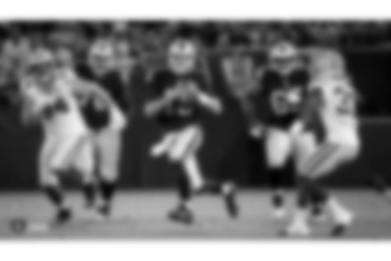 Oakland Raiders quarterback Connor Cook (18) during The Oakland Raiders preseason game against the Green Bay Packers at Oakland-Alameda County Coliseum, Friday, August 24, 2018, in Oakland, California. The Oakland Raiders won 13-6.