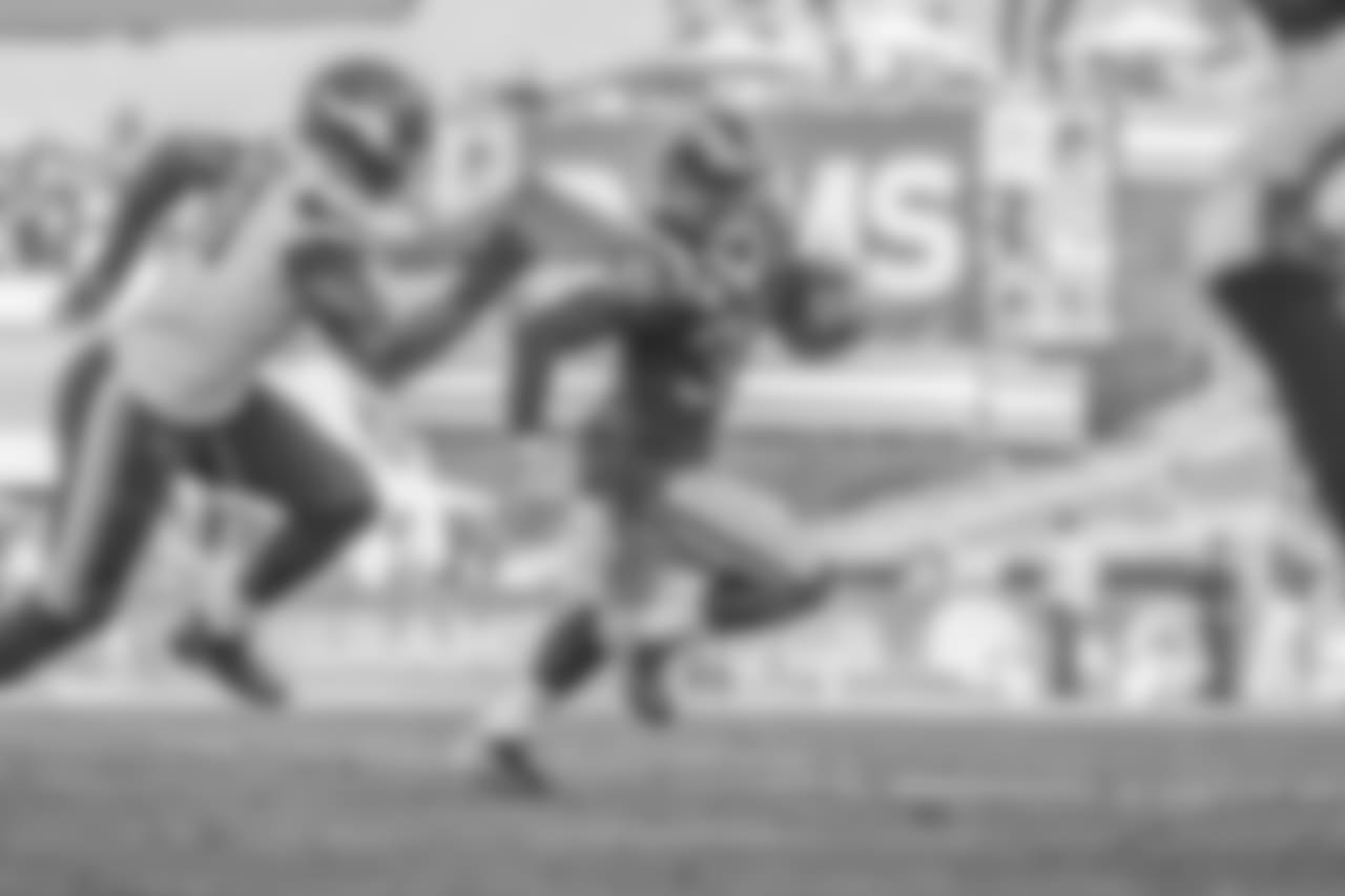 Los Angeles Rams running back Todd Gurley (30) runs the ball during an NFL Week 4 Football game against the Minnesota Vikings. The Thursday Night Football game was simulcast on NFL Network, FOX, and Amazon Prime Video at the Los Angeles Memorial Coliseum in Los Angeles, Calif. on September 27th, 2018 (Hiro Ueno/Rams).