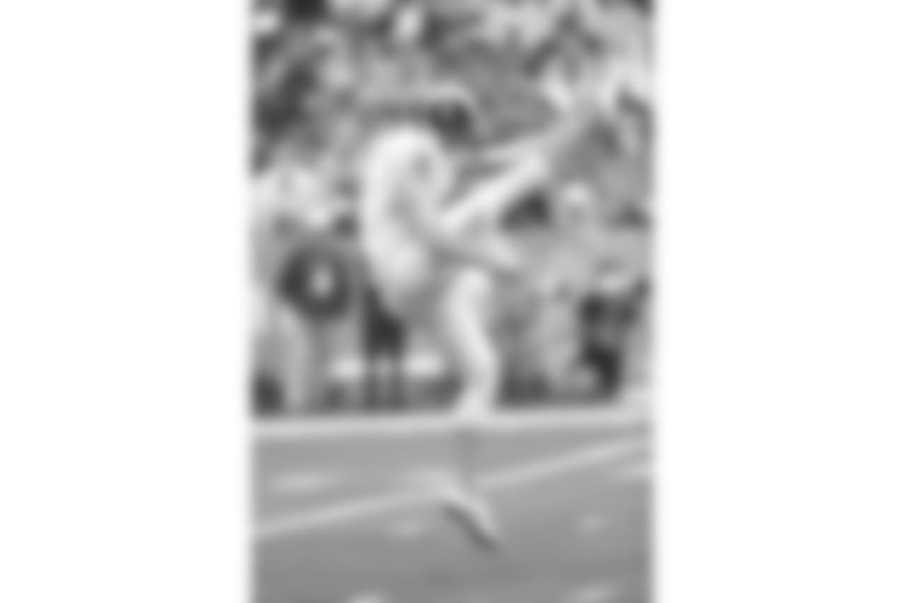 Johnny Hekker (6) kicks a punt during the NFL Pro Bowl all-star football game, Sunday, January 26, 2014 in Honolulu. (AP Photo/Paul Jasienski)