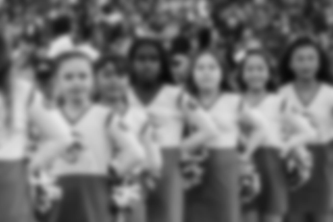 The Los Angeles Rams Cheerleaders perform during halftime along side the Junior Cheer squad as the Los Angeles Rams face off against the San Francisco 49ers at the Los Angeles Memorial Coliseum, the Rams win 48-32 in an NFL Week 17 game, Sunday, December 30, 2018, Los Angeles, CA. (Will Navarro/Rams)