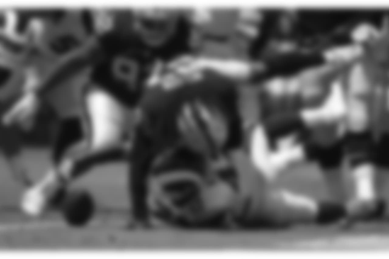Los Angeles Rams running back John Kelly rovers his own fumble against the Oakland Raiders during the first half in an NFL preseason football game Saturday, Aug. 18, 2018, in Los Angeles. (AP Photo/Mark J. Terrill)