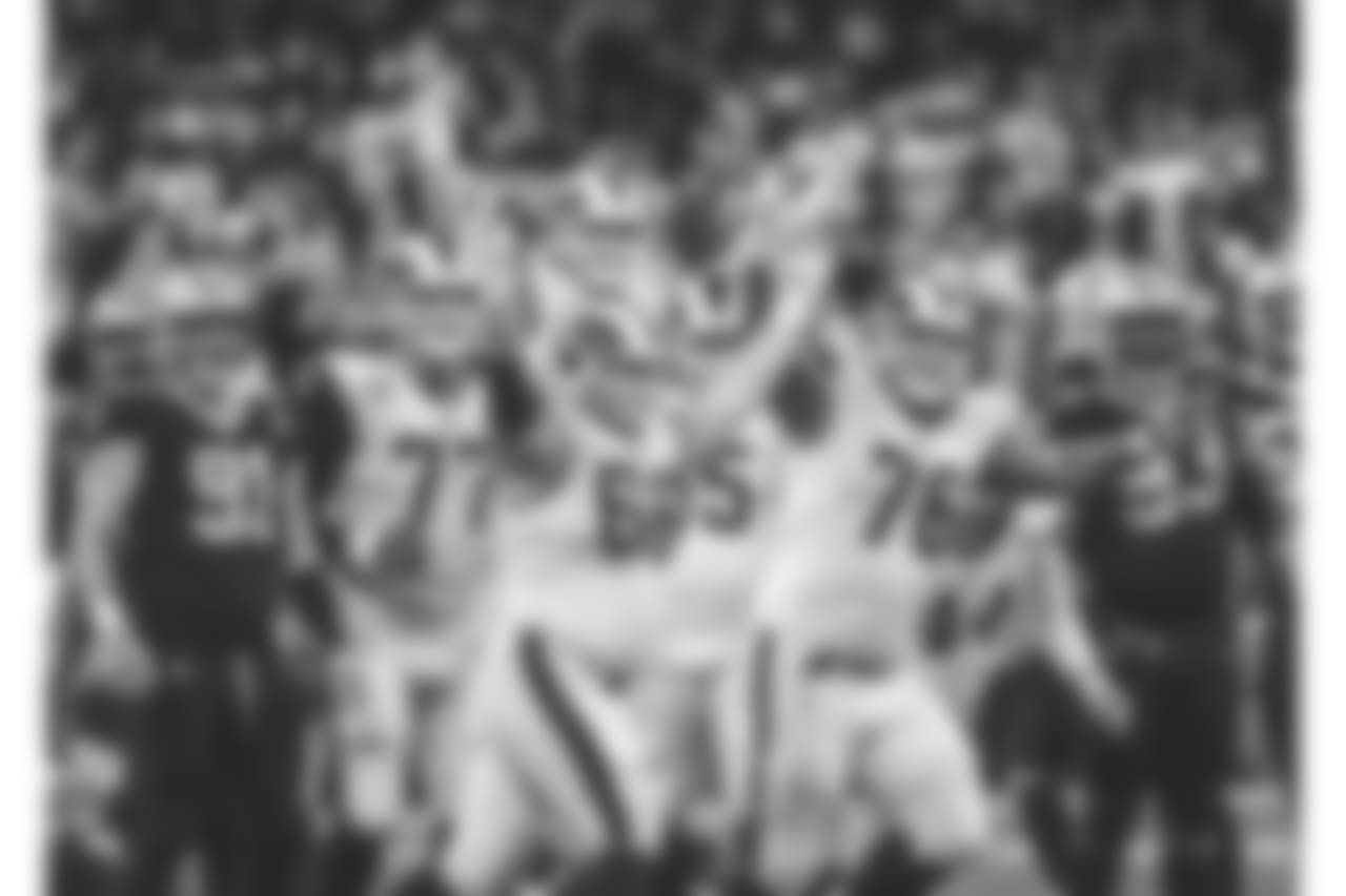 Los Angeles Rams players celebrate after overtime of the NFL football NFC championship game against the New Orleans Saints, Sunday, Jan. 20, 2019, in New Orleans. The Rams won 26-23. (AP Photo/Gerald Herbert)