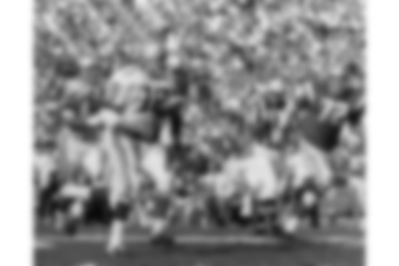 Roman Gabriel (18) rolls out to pass during the 1968 NFL Pro Bowl in Los Angeles, Calif. The West defeated the East 38-20. (AP Photo/NFL Photos)