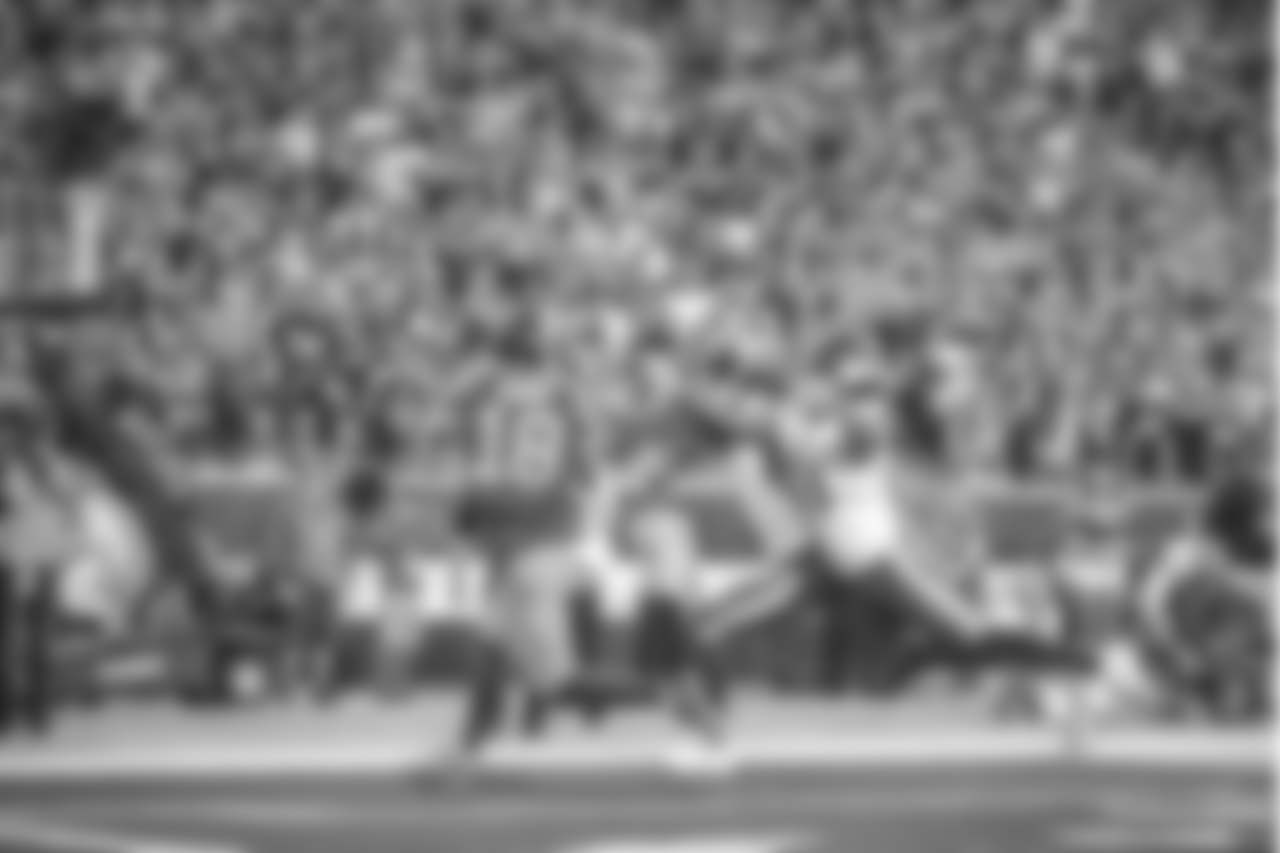 Los Angeles Rams wide receiver Cooper Kupp (18) catches a touchdown pass during an NFL Week 4 Football game against the Minnesota Vikings. The Thursday Night Football game was simulcast on NFL Network, FOX, and Amazon Prime Video at the Los Angeles Memorial Coliseum in Los Angeles, Calif. on September 27th, 2018 (Hiro Ueno/Rams).
