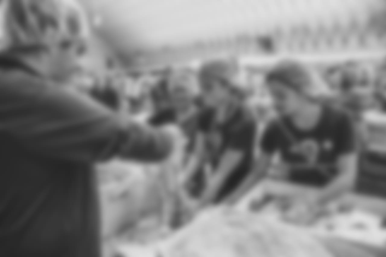 Staff of the Los Angeles Rams volunteer their time by packing meals for the hungry in honor of 9/11 in Los Angeles, CA on Sept 11th, 2018 (Rams/Hiro Ueno).