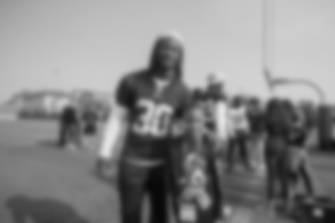(30) Todd Gurley of the Los Angeles Rams greets Tragedy Assistance Program for Survivors families after a walk through , Saturday, November 10, 2018, in Los Angeles, CA. (Jeff Lewis/Rams)