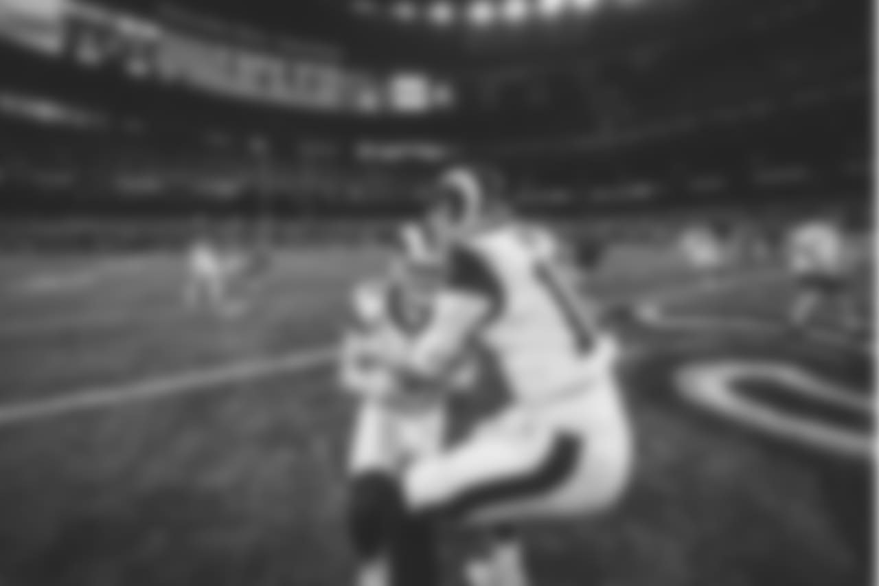 Los Angeles Rams quarterback Jared Goff (16) and Los Angeles Rams punter Johnny Hekker (6) during an NFL football game against the XXXX, Sunday, Jan. 20, 2019 in New Orleans. (Ric Tapia/NFL)