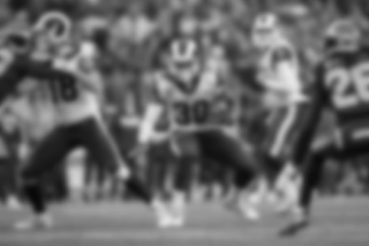 Running back (30) Todd Gurley of the Los Angeles Rams runs the ball against the Seattle Seahawks during the Rams 42-7 victory over the Seahawks in an NFL Week 15 football game, Sunday, December 17, 2017 in Seattle, WA. (Jeff Lewis/Rams)