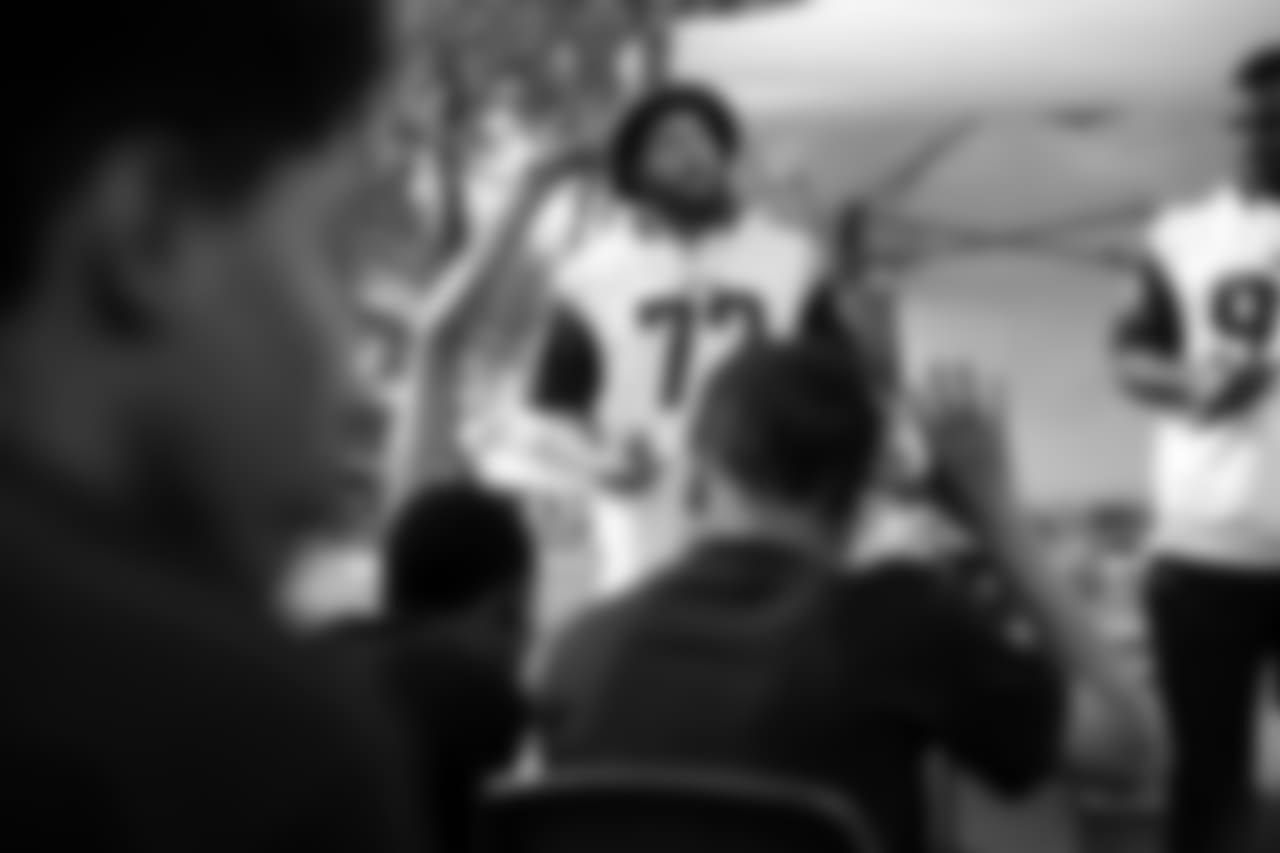 Los Angeles Rams offensive lineman Aaron Neary and defensive lineman John Franklin-Myers surprise the Kayne Era Center bulldogs at practice with football equipment and cleats in Culver City, Calif. on October 2nd, 2018. The Kayne Era Center (KEC) is a nonpublic special education school for students in grades k-12 (Hiro Ueno/Rams).